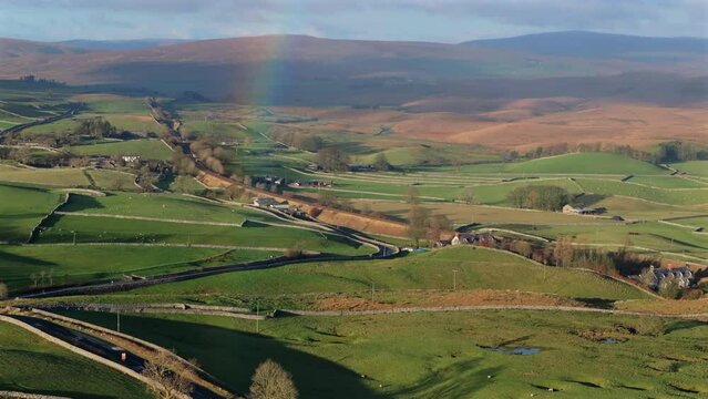 Establishing Drone Shot of Yorkshire Dales Landscape and Rainbow UK