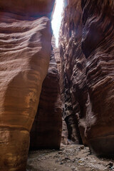 High  mountains along edges of gorge at the beginning of walking route along  Wadi Numeira gorge in Jordan