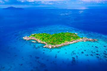 Aerial view of the Similan Islands, Andaman Sea, natural blue waters, tropical sea of Thailand. The islands are shaped like a heart, the beautiful scenery of the island is impressive.  