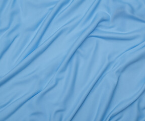 Obraz premium Texture of blue fabric top view. Pink pile fabric with pleats
