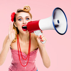 Blonde haired woman holding mega phone loudspeaker, shout something. Girl in red pin up style...