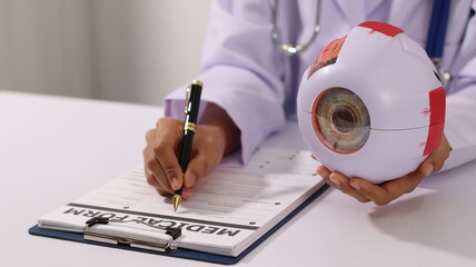 Initial AI illustration of a close-up of a female doctor's hand signing a medical document on a...