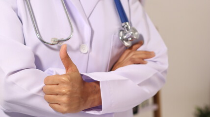 Initial AI illustration of a close-up of a female doctor's hand signing a medical document on a...