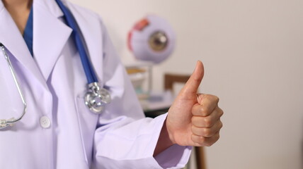 Initial AI illustration of a close-up of a female doctor's hand signing a medical document on a...