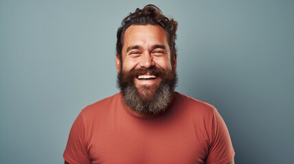 Obraz premium Happy smiling middle aged adult man on a solid background