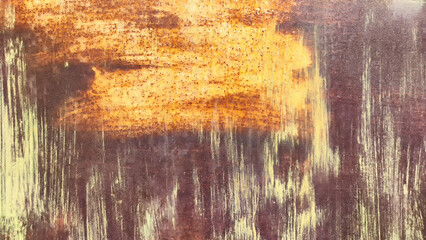 Corroded metal background. Rusted metal wall. Rusty metal background with streaks of rust. Red or yellow Rust stain. The metal surface rusted spots