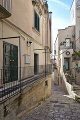 Fototapeta premium A street in Gravina in Puglia, an old town in Italy.