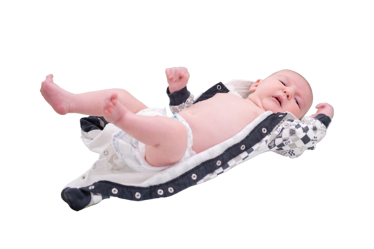Baby infant boy lies in a diaper on the changing table, isolated on a white background. Happy child changing clothes. Kid aged two months