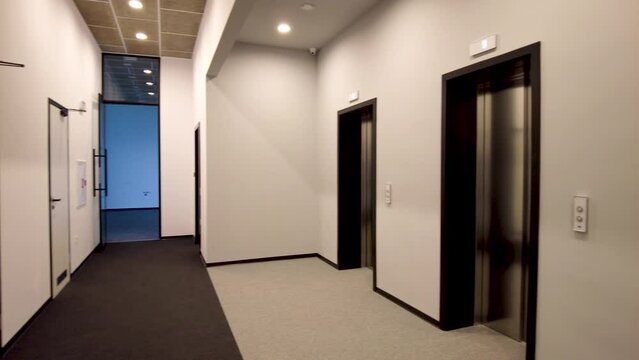 Modern elevators in a business lobby, hotel or store. Interior of modern building.