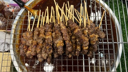 Grilled barbecue beef sticks for sales.