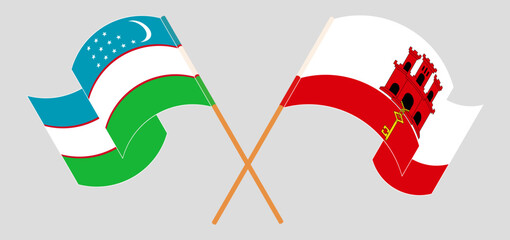 Crossed and waving flags of Uzbekistan and Gibraltar