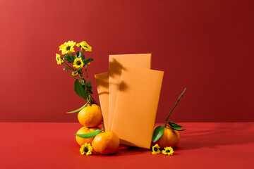 Red background featured some envelopes in yellow color and tangerines. Flowers decorated. The...