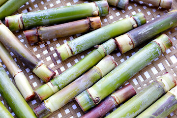 Fresh sugar cane on bamboo weave plate