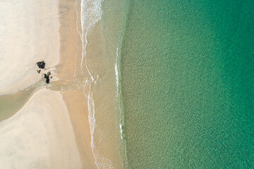 aerial drone view of a beach shore in summertime. Portugal