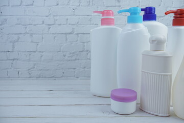 Set of plastic pump bottles body care beauty products of shampoos and shower cream