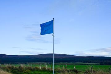 flag in the wind