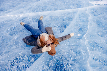 Woman background ice with gas methane bubbles lake Baikal winter