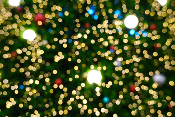 Blurred lights on Christmas tree decorate. 