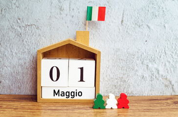 Wooden calendar with the date 01 May . International Workers' Day in Italy 
