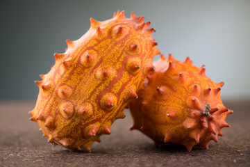 Kiwano fruit or Horned melon close up. Fresh and juicy African horned cucumber or jelly melon,...