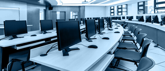 Group of computers in computer lab - obrazy, fototapety, plakaty