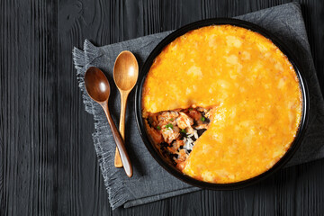 cheesy chicken rice salsa casserole in baking dish