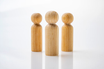 Closeup view row of wooden figure