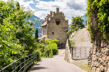 Merano in South Tyrol, Trentino Alto Adige,northern Italy, June 14, 2023: Tappeiner Promenade in summer season - obrazy, fototapety, plakaty