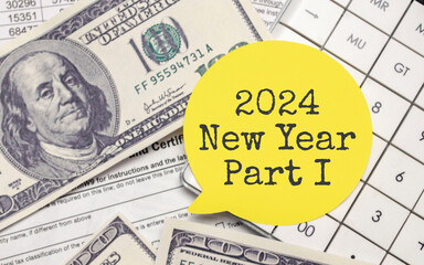 2024 NEW YEAR CHAPTER ONE on yellow sticker with pen and calculator
