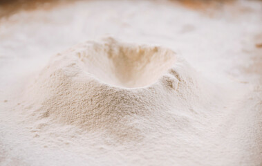 Close up of a mound of flour .