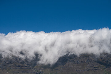 Table mountain covered with cloud of fog