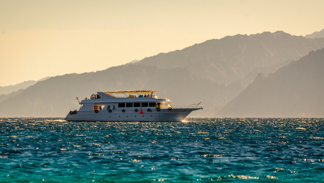big boat on the background of high mountains in Egypt Dahab South Sinai