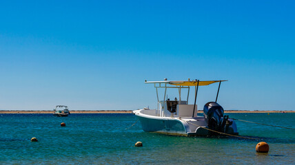 two boats in the sea on the background of the coast in Egypt