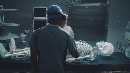 Diverse surgeons in AR headsets work in operating room, perform virtual surgery using holographic...