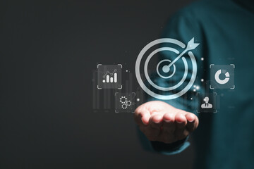 Businessman with target icon for business objective. Strategic planning for business growth and...