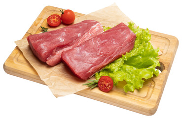 Fresh tuna Fish steak on a wooden cutting serving board isolated
