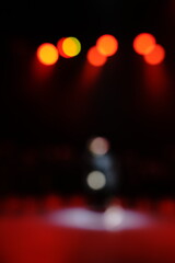 Defocused entertainment concert lighting on stage, blurred disco party and Concert Live.