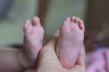 baby feet in bed