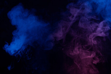 Blue and pink steam on a black background.