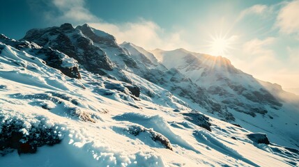 Fototapeta na wymiar Mountain Peak covered in fresh Snow in the Winter Sun