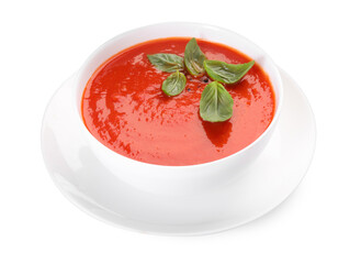 Delicious tomato cream soup in bowl isolated on white