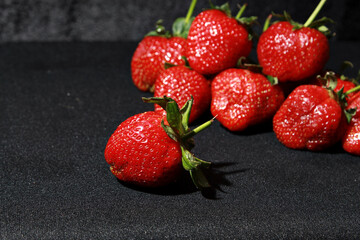 strawberries on a wooden background