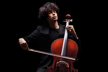Young male artist playing a cello - obrazy, fototapety, plakaty