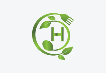 Nature and latter H with frok and spoon and healthy food