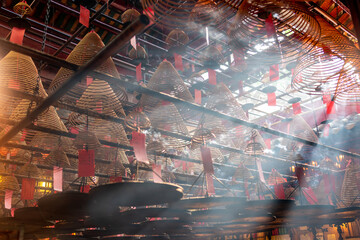 Incense coils and smoke inside Man Mo Temple