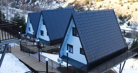 A Frame cabins in the winter park