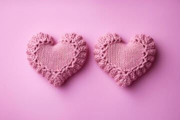 crocheted hearts on a pink background