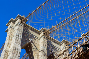 Brooklyn Bridge, New York City, USA with awesome architectural historic scenery details
