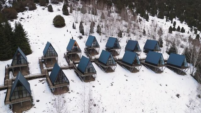 A Frame cabins in the winter park