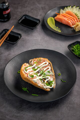 Fried Temaki Sushi. Salmon and Cream Cheese Temaki.	